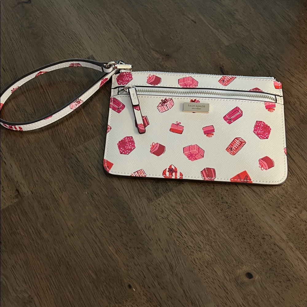 Kate Spade White Wristlet with Pink Gift Motif